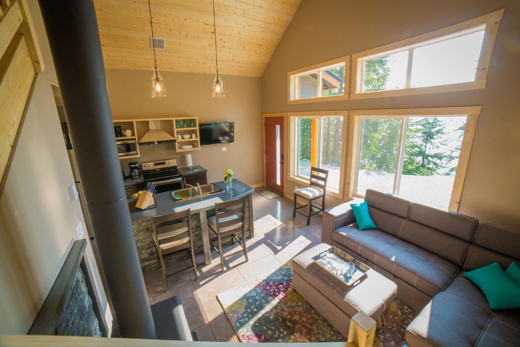 Chalet interior from above showing kitchen, dining and living area